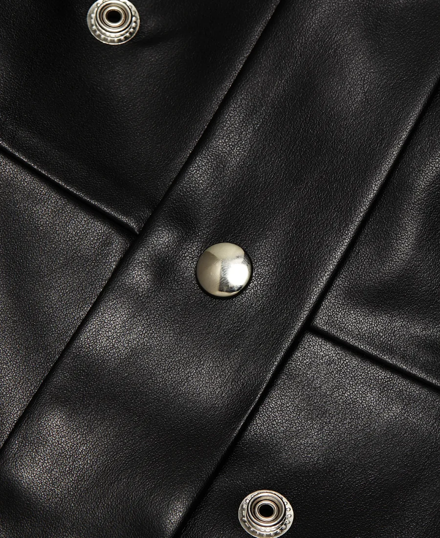 Only Murders In The Building S05 Mabel Mora Grommet Leather Coat Fabric Image