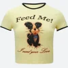 Too Much 2025 Wendy Jones Feed Me Dog T-Shirt Front Image